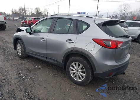 2014 Mazda Cx-5 Sport z USA, uszkodzony, nr VIN JM3KE2BEXE0311819